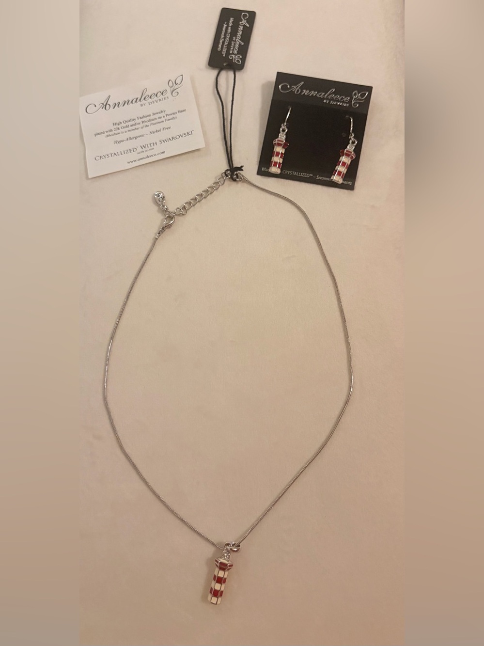 Annalee Silver Necklace with Red & White Lighthouse Crystal Charm